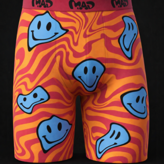 Close-up of Meallday Melt Boxer Briefs in Tiger Sky colorway, featuring a high-contrast orange and deep red wavy marble pattern with melting electric blue smiley faces and a red waistband with black MAD logos.